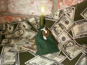 A money mojo prepared with a Chinese cash coin, ready for dedication on a money altar